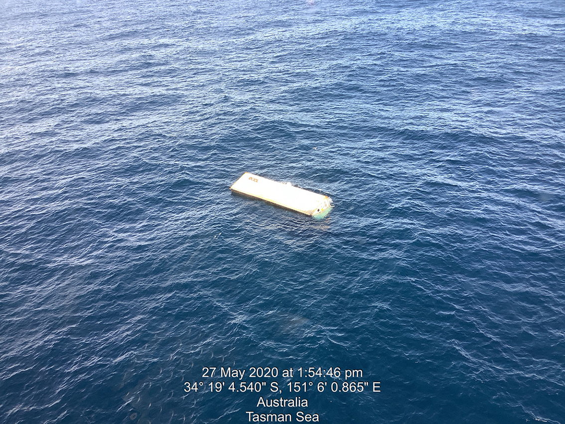 Containers lost overboard from the ship APL England floating off the coast of NSW
