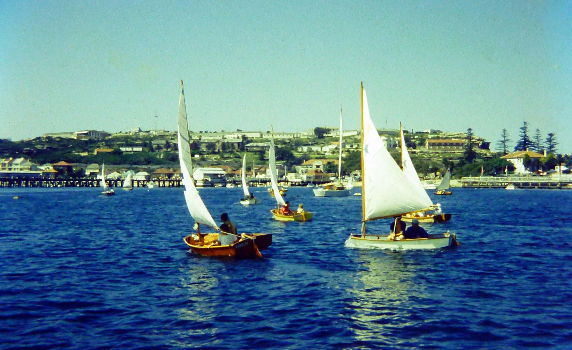 The sabot RAMBLER (seen here at Watsons Bay) was built by our uncle Norm Brown, it was a beautiful boat but we sucked sailing it. Norm was a highly regarded builder, Rob Brown's father. Norm built a series of boats for Rob, and a couple of trailer sailers for himself.