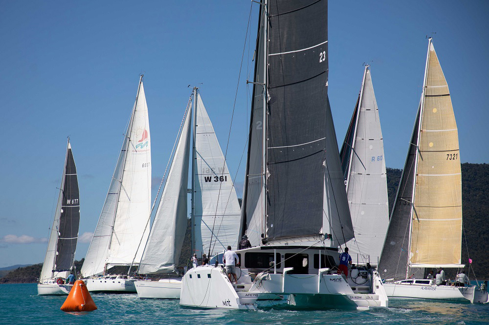 Airlie Beach Race Week Multihull Mint pushes her way through the monohulls - Shirley Wodson pic, ABRW 2020