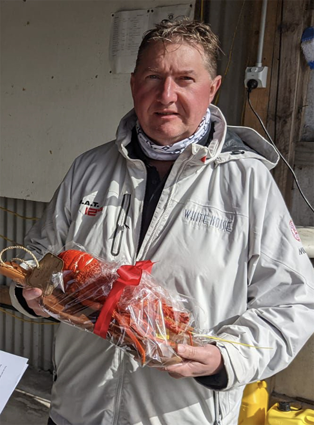 ORCV Daniel Edwards collects his cray after winning the King Island Race - pic courtesy ORCV
