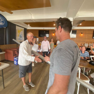 Johnnie Denton awarding the Whalespars boom to Todd Anderson. Photo Glen Hickey