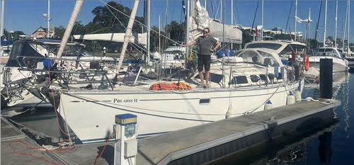 The yacht Polaris 2, a Bluewater 400, moored in a marina